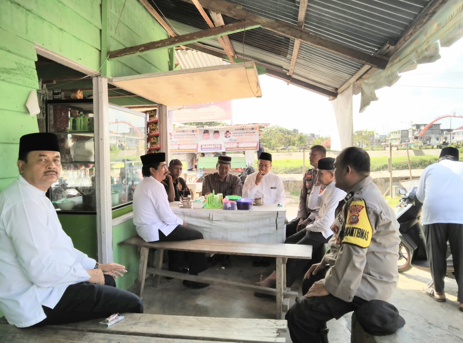 Polsek Rambah Gelar Cooling System Pilkada 2024 Bersama Masyarakat Dusun Nogori