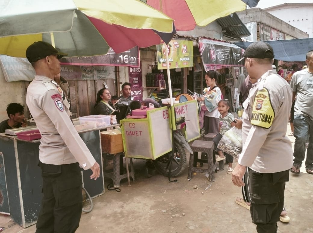 Polsek Langgam Tingkatkan Keamanan di Pasar Kaget