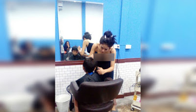 Cantik dan Seksi, Tukang Cukur Ini Bikin Betah Pelanggan Pria