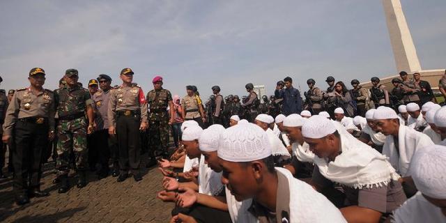Lantunan Ayat Suci Polisi Dari Kantor Basuki