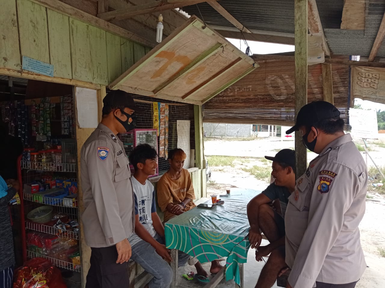 Polsek Langgam Sosialisasikan Prokes Covid 19 di Desa Segati