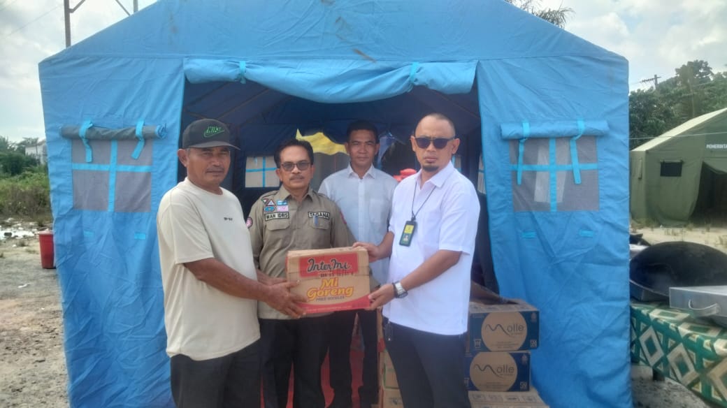 Dinsos Siak Tinjau dan Saluran Bantuan ke Posko Pengusian