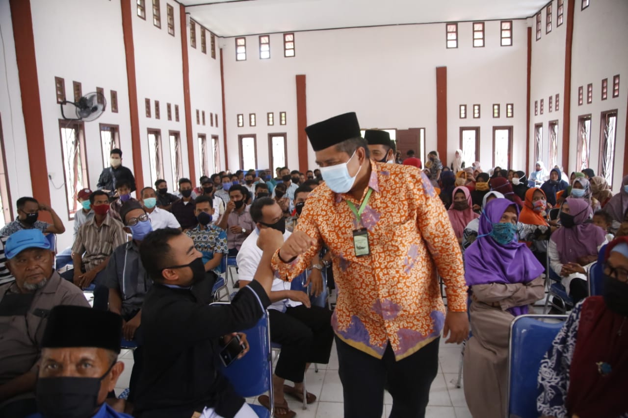 Dalam Kegiatan Sosialisasi Bahaya Narkotika, Bupati Siak Alfedri Ingatkan Masyarakat Patuhi Prokes COVID-19