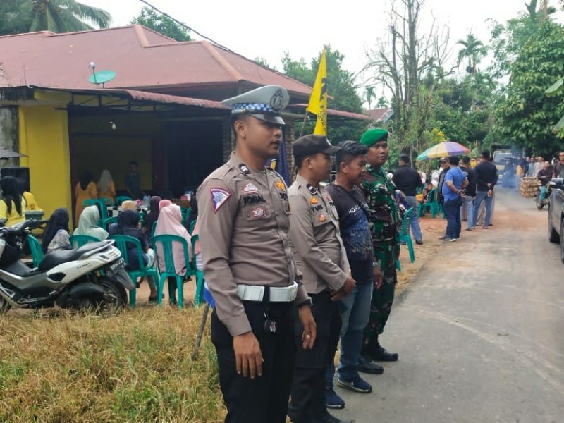 Polres Kuansing Amankan Kampanye Paslon Cabup-Cawabup di Desa Pulau Mungkur