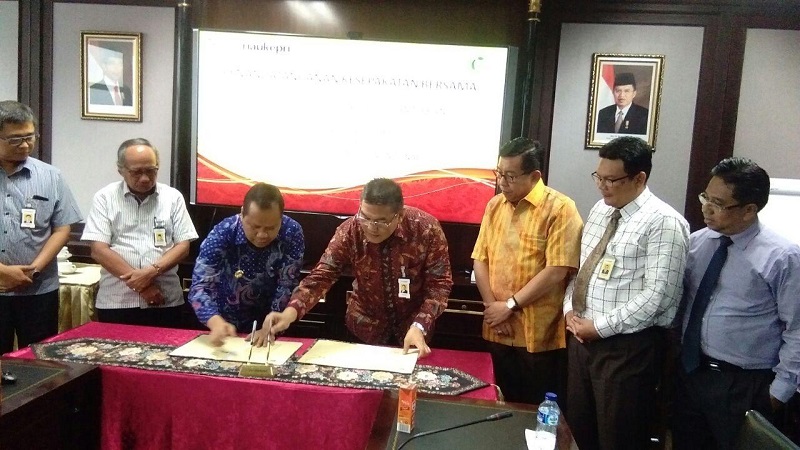 Pemkab Meranti dan BRK Teken MoU Pelaksanaan Transaksi Non Tunai