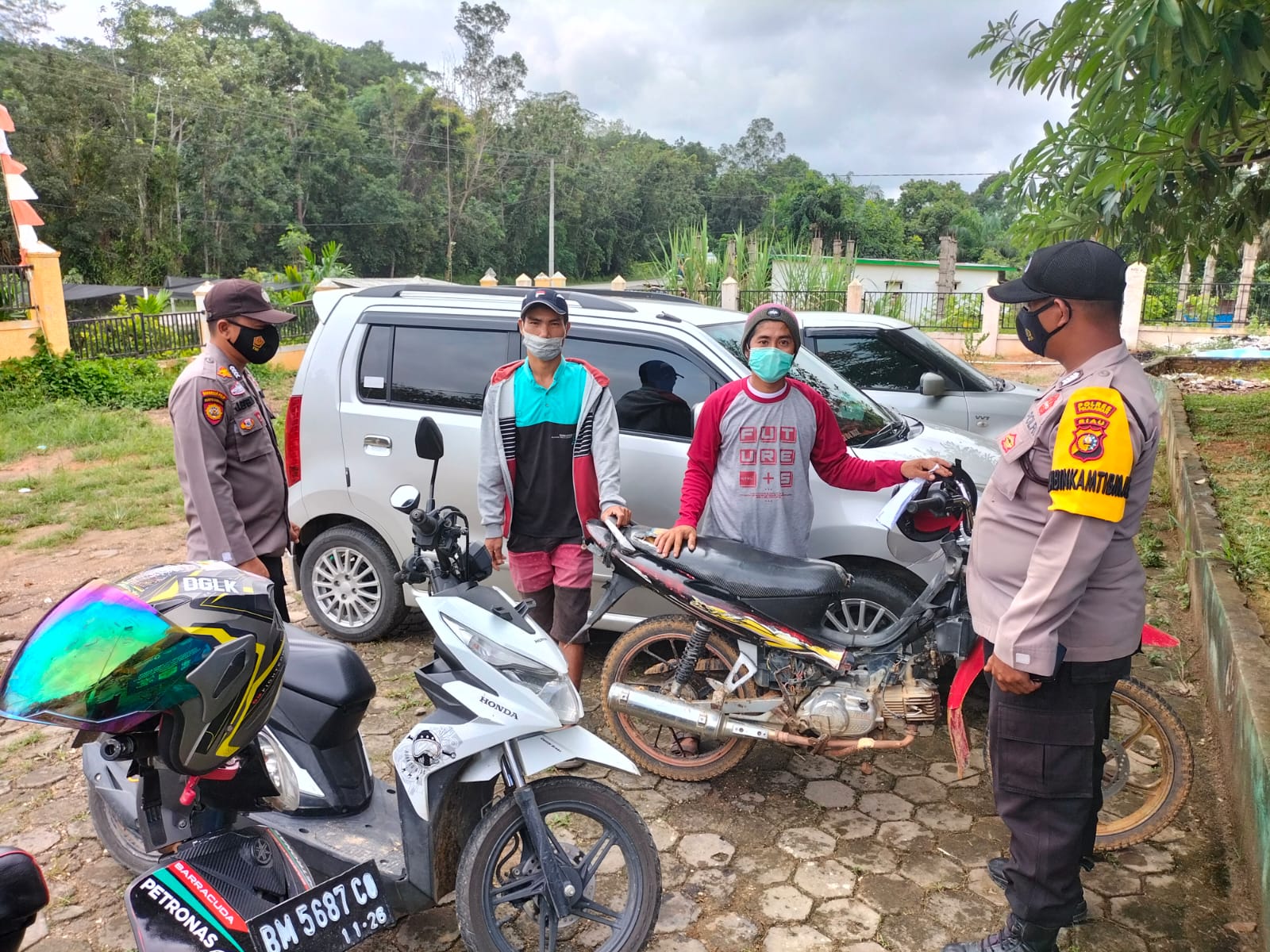 Disela Imbau Prokes, Polsek Pangkalan Lesung Juga Bagikan Masker Gratis