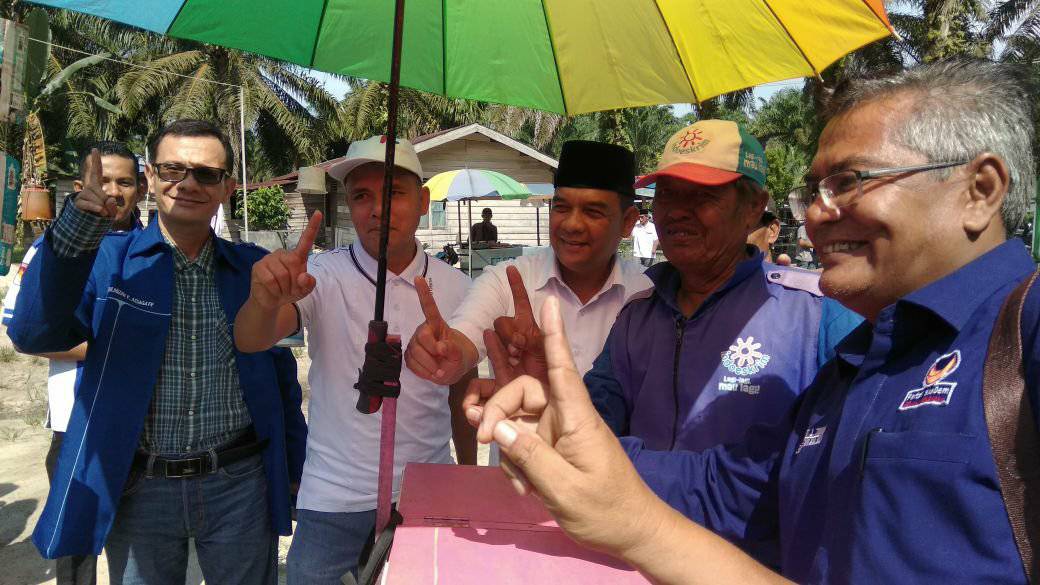 Di Pasar Belutu Kandis, Pedagang Siap Menangkan Syamsuar - Edy Nasution