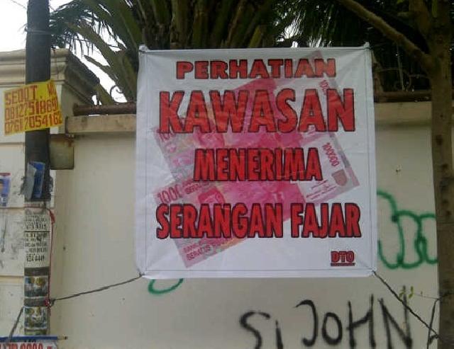 Spanduk Menerima Serangan Fajar Mulai Bermunculan di Pekanbaru