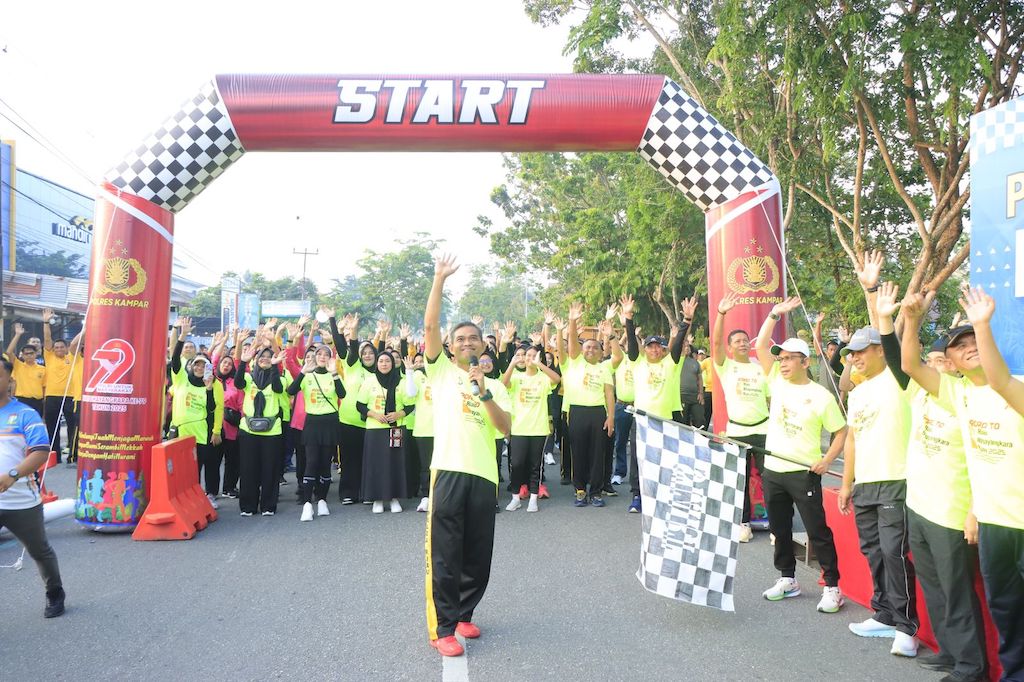 Polres Kampar Gelar Fun Run Bhayangkara, Tanam 79 Pohon untuk Lingkungan