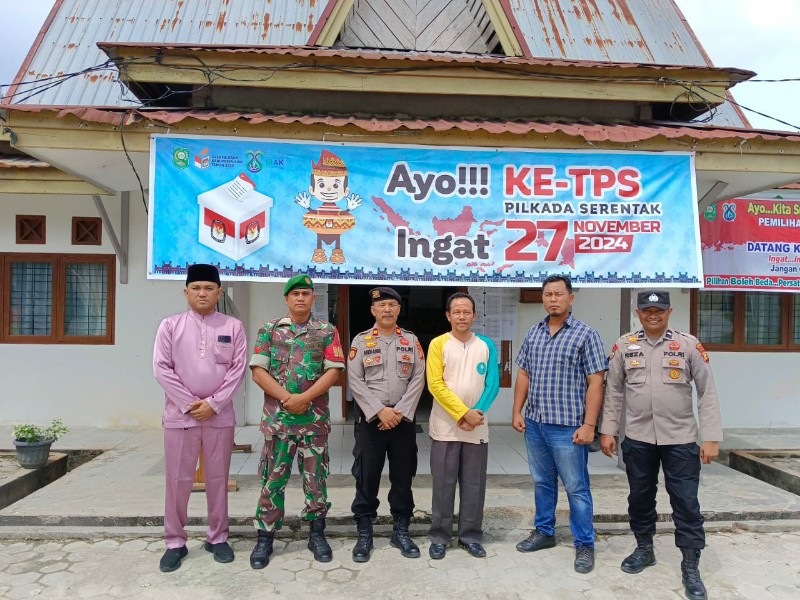 Polsek Minas Perkuat Pengamanan Pilkada 2024 Melalui Patroli Dialogis Bersama TNI