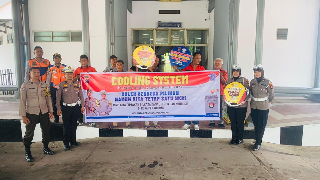 Satlantas Polresta Pekanbaru Gelar Kampanye Keselamatan Berlalu Lintas dan Sosialisasi Pilkada Damai 2024