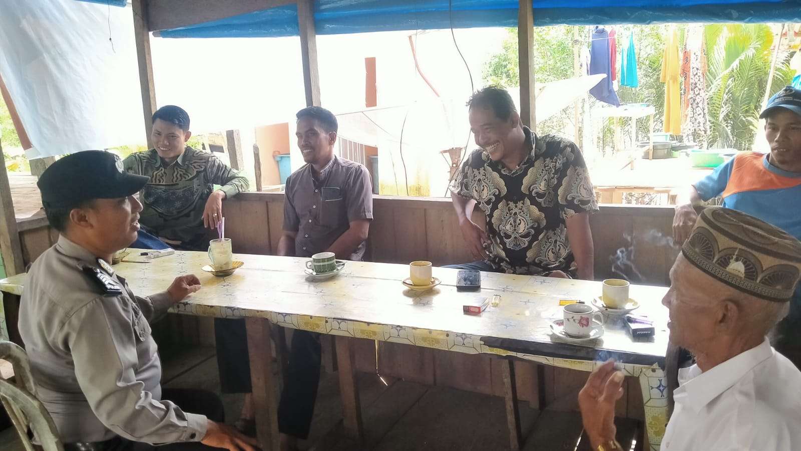 Bripka Aan Wahyudi Sosialisasi Pemilu 2024 Melalui Cooling System di Desa Rantau Panjang