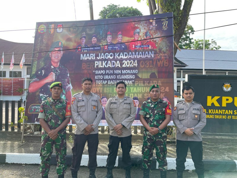 Polres Kuansing Bersama TNI Jaga Ketat Kantor KPU demi Cipta Kondisi Pilkada Serentak 2024