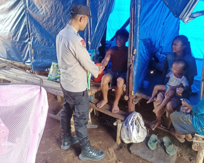 Bhabin Polsek Langgam Kawal Pilkada Damai di Desa Penarikan