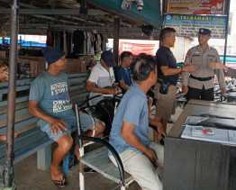 Cooling System Polsek Tembilhan Sosialisasi Pemilu di Jalan Diponegoro