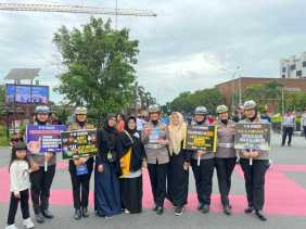 Polisi Sosialisasikan Keselamatan Lalu Lintas dan Pilkada Damai di Car Free Day Pekanbaru