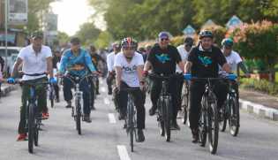 Meriahkan TdSi 2022, Bupati Siak Bersepeda Keliling Kota Siak Dengan Pembalap dan Masyarakat