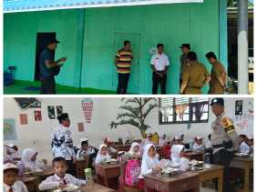 Polsek Rimba Melintang Dampingi Distribusi 2.109 Paket Makanan Bergizi Gratis di Sekolah