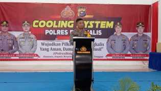 Kapolsek Bukit Batu Kompol Rifendi Pimpin Cooling System Pilkada di Rayon II untuk Ciptakan Pemilu Damai