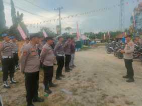 Personel Polres Kuansing Pengamanan Kampanye Pilkada 2024 Paslon Cabup-Cawabup di Kecamatan Singingi Hilir
