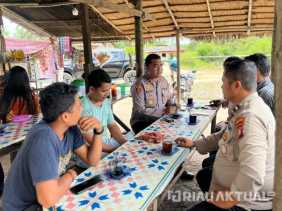 Sambil Ngopi, Kapolsek TPTM Ajak Warga Cegah Karhutla