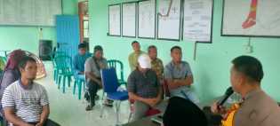 Polsek Teluk Meranti Sosialisasi Pilkada Damai di Kantor Desa