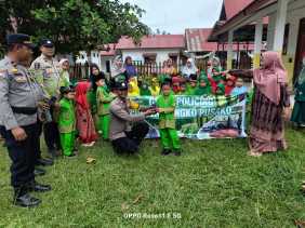 Polsek Bangko Pusako Sosialisasikan Program Kapolda Riau ‘Green Policing’ dan Tanam Pohon di TK Negeri 1