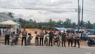 Sinergi Polsek Rimba Melintang dan TNI Gelar Patroli Kamtibmas di Rohil