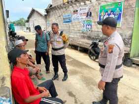 Kapolsek Gaung Temui Masyarakat Kuala Lahang untuk Sampaikan Pesan Damai Jelang Pemilu