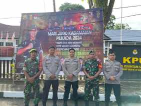 Polres Kuansing Bersama TNI Jaga Ketat Kantor KPU demi Cipta Kondisi Pilkada Serentak 2024